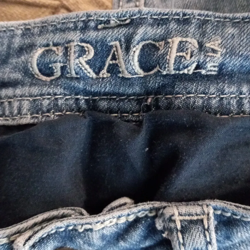 Grace in L.A. 26x32 Distressed Rivet Flap Pocket Light Wash Jeans - Image 10