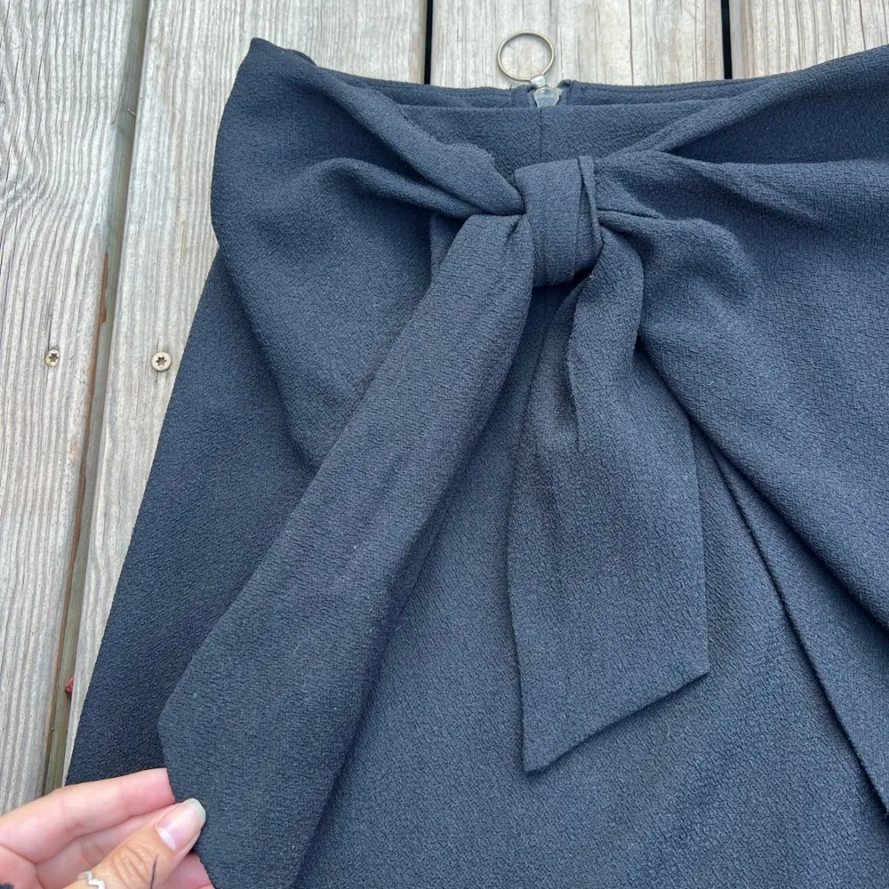 NWT who what wear | size 8 | jet black skirt with bow - Image 3