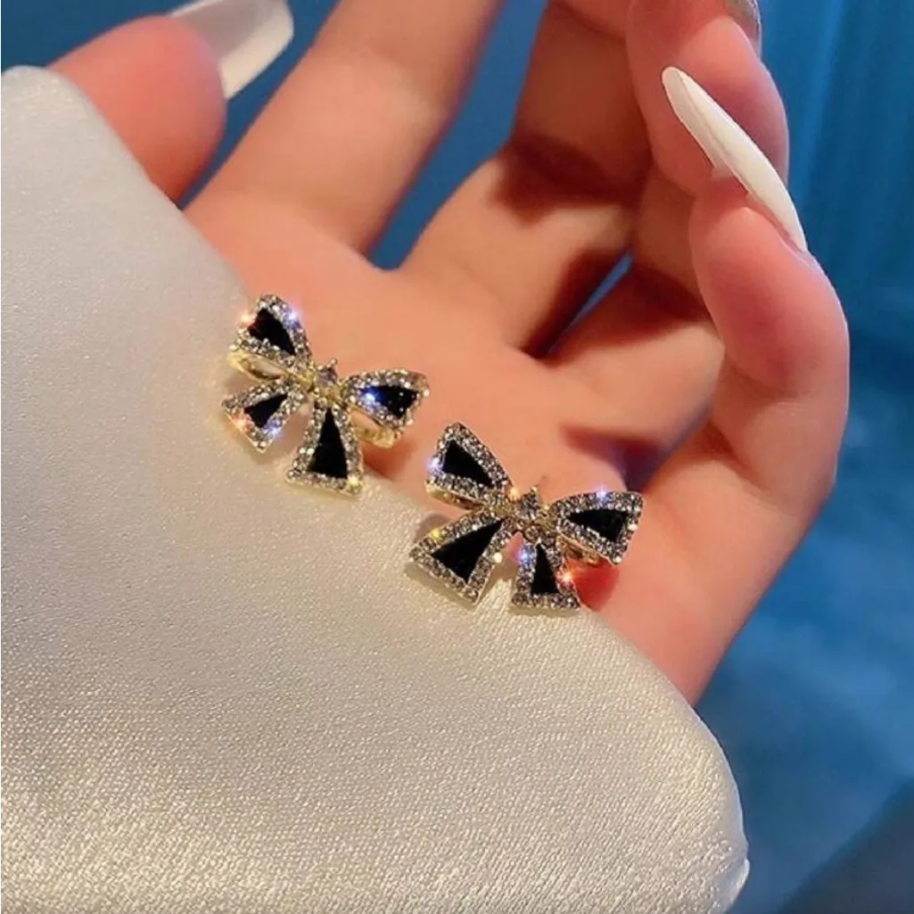 Elegant Black and Gold Bow Earrings - Image 3