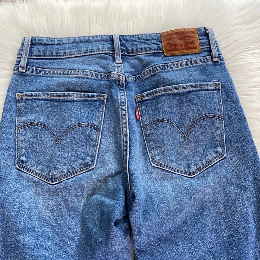 721 Ripped Knee High Rise Skinny Jeans - Image 11