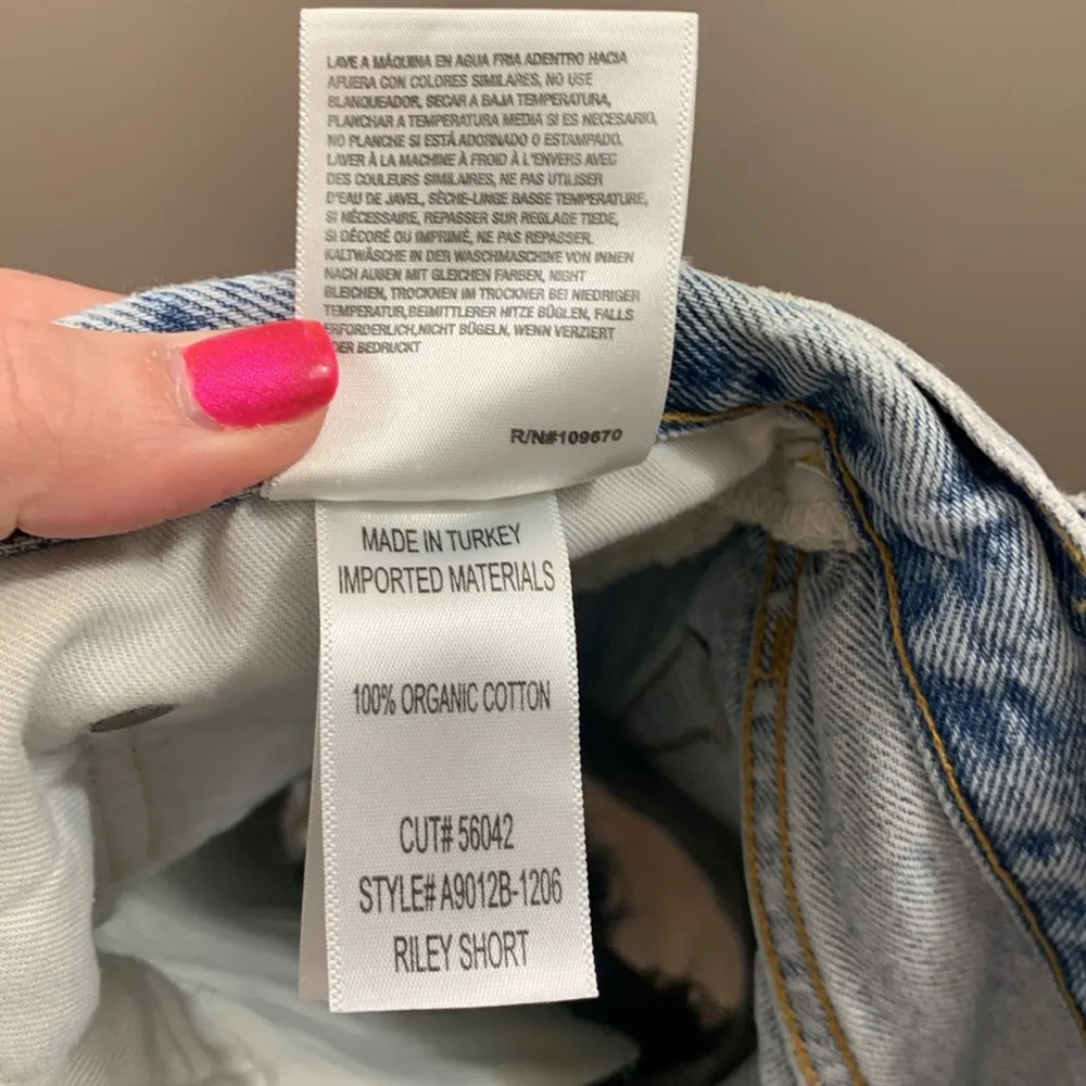 AGOLDE  Riley Short Light Wash Button Fly Distressed Cutoff Denim Shorts - Image 5