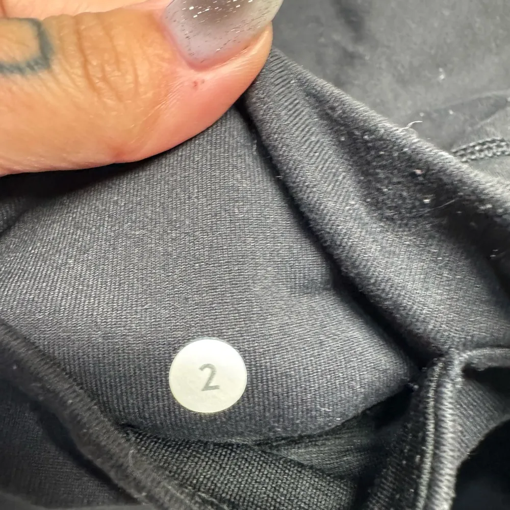 Lululemon Black Leggings with Sheer side panels with Criss Cross details- size 2 - Image 3