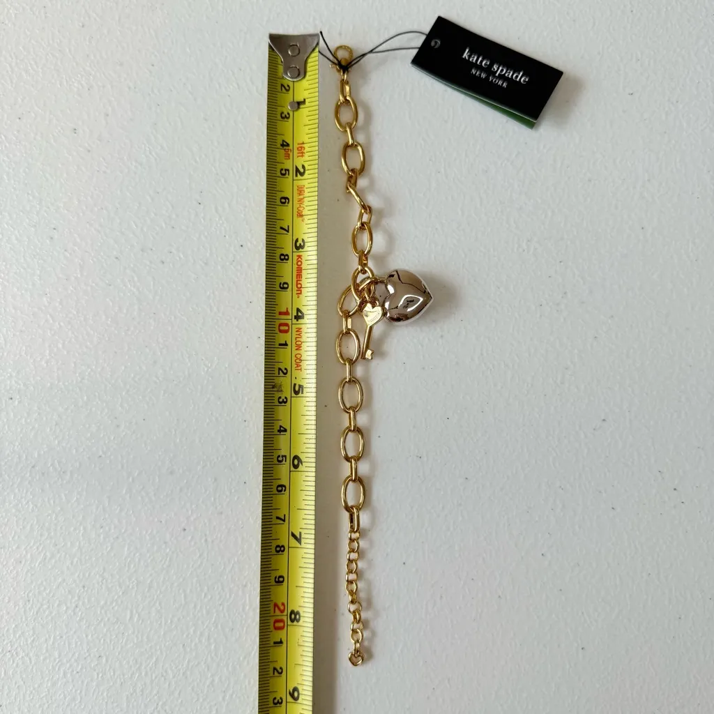 Kate Spade NWT Gold and Silver Heart You with lock and key Charm Bracelet - Image 3