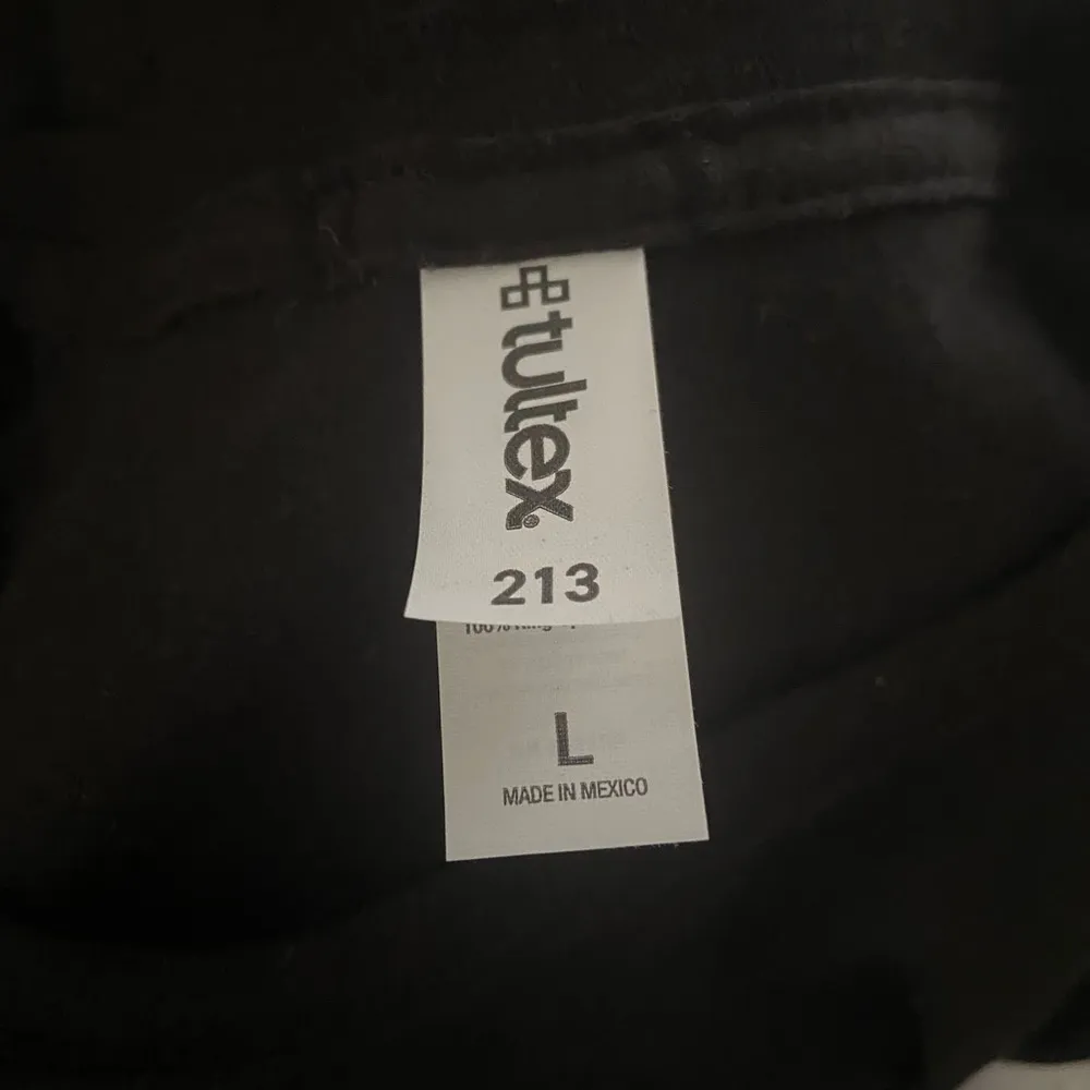 Friend’s large black t-shirt. - Image 5