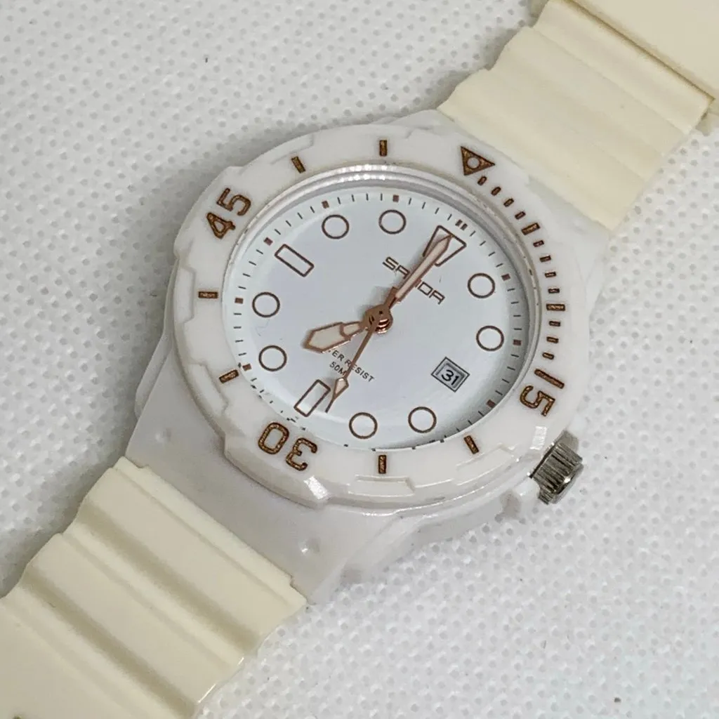 Sanda women’s date watch white tone 35mm round quartz analog plastic running - Image 2