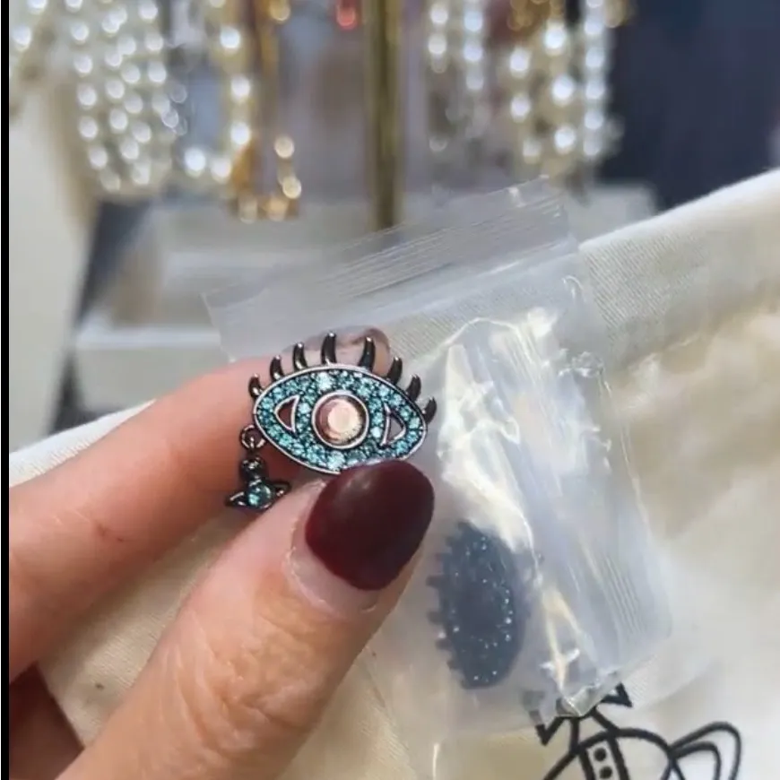 NEW pair of Vivienne Westwood Evil Eye stud earrings blue and turquoise crystal - Image 2