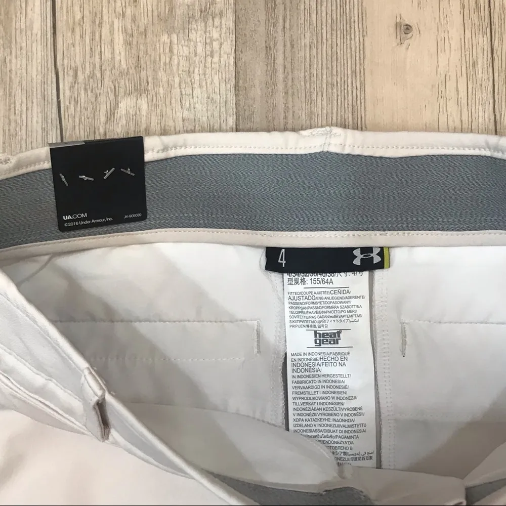 NWT UNDER ARMOUR size 4 GOLF SHORTS vanilla khaki - Image 9