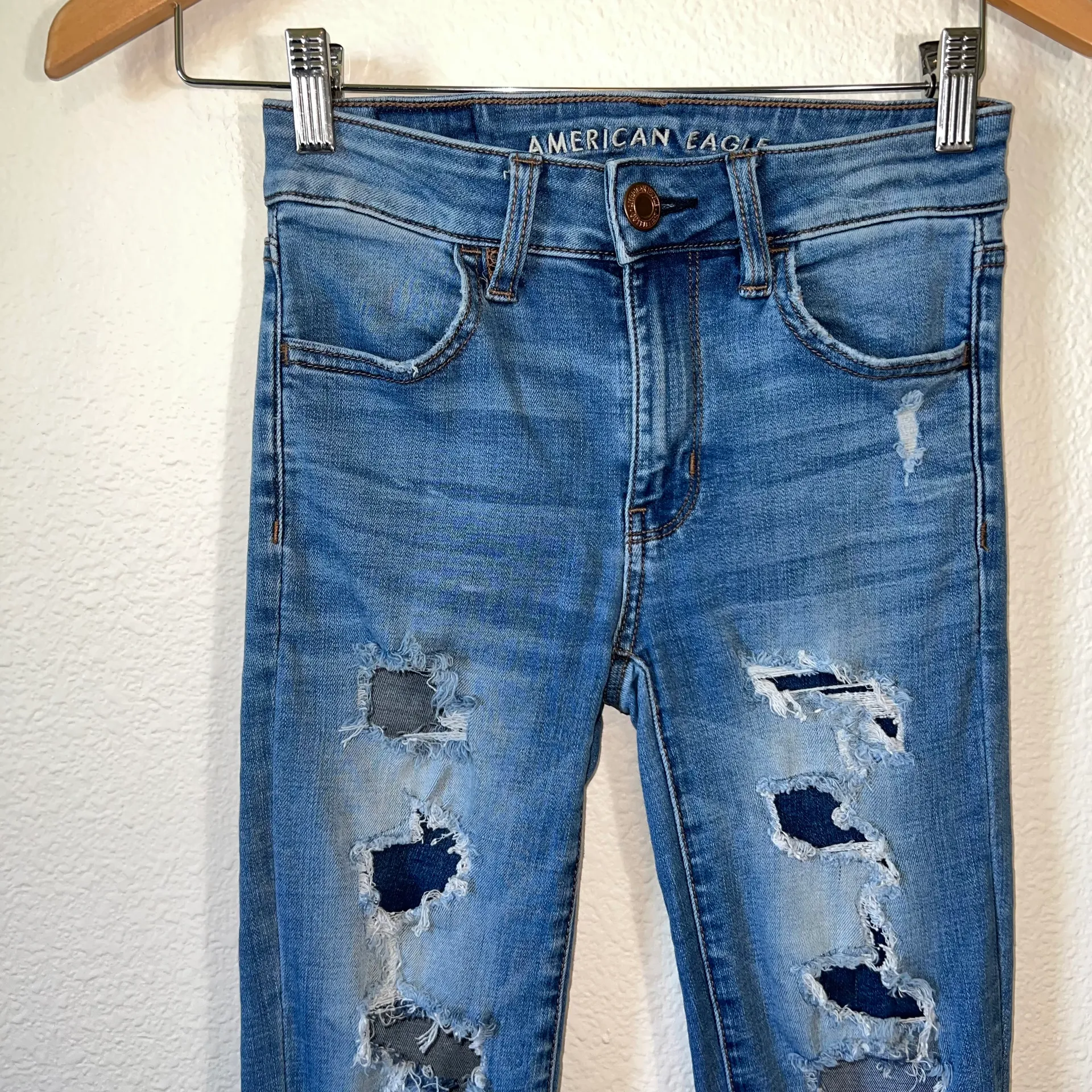 American Eagle  - AEO Light Wash Distressed Super Stretch Hi Rise Jegging Jeans - Image 2