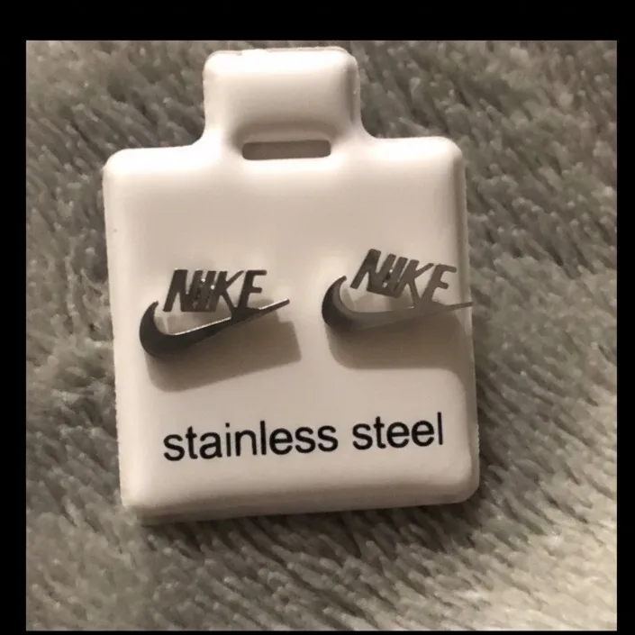 Nike silver stainless steel Logo Earrings. Never worn - Image 2