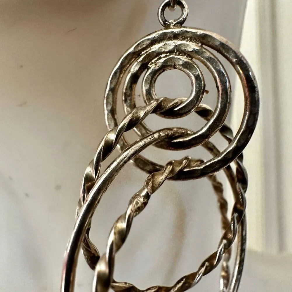 Silver tone multi circle dangling earrings - Image 3