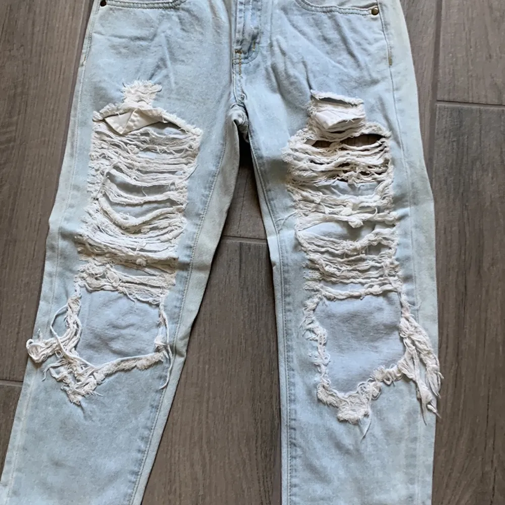Reverse  distressed denim jeans - Image 2