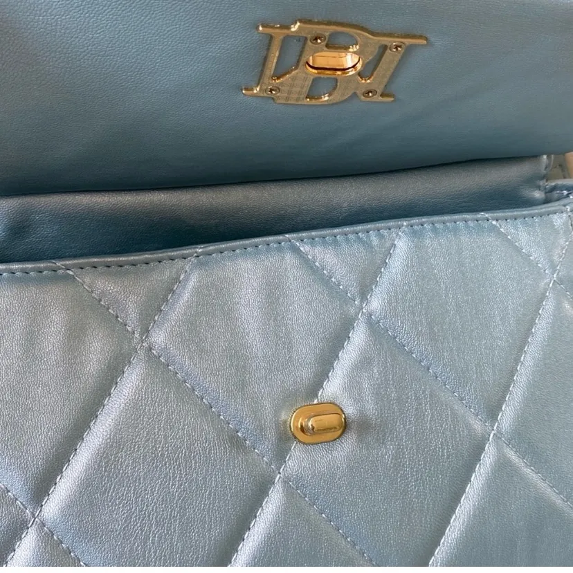 Light and ethereal quilted convertible crossbody rests like a dream on your arm - Image 10