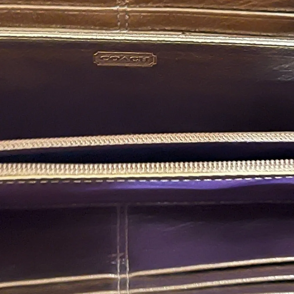 COACH signature Charlie C zip around wallet gold with purple interior - Image 13