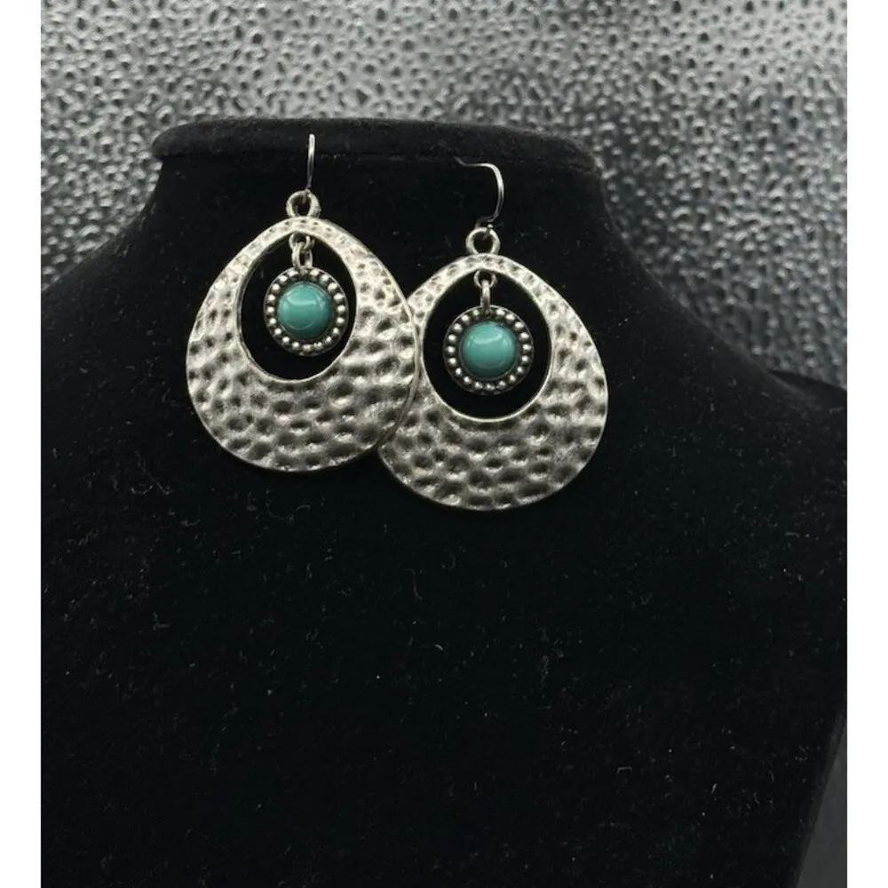 Silver Toned Hammered Hoop Oval Earrings With Turquoise Toned Stone Dangle - Image 2
