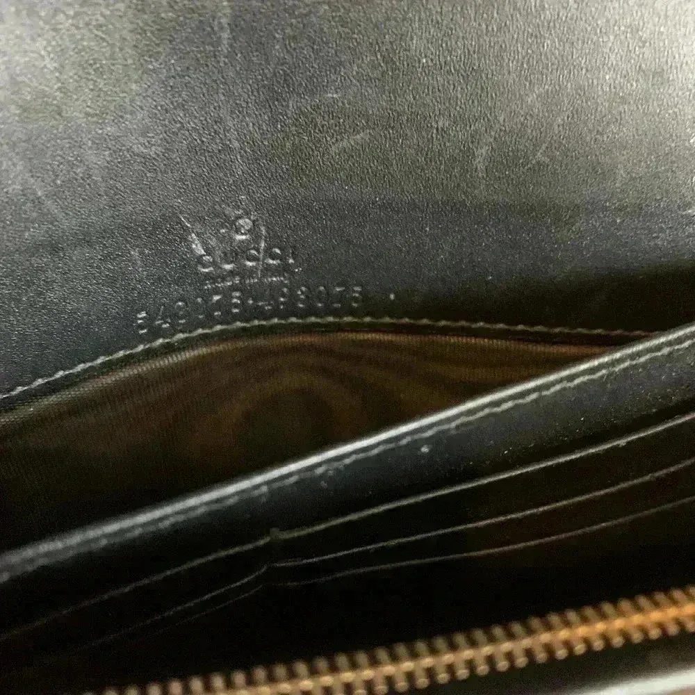 Gucci mini leather chain bag with double G stripe in black and gold. - Image 12