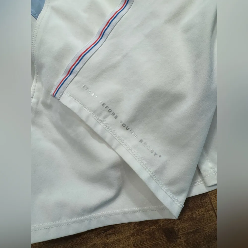 White and Blue Athletic Skorts with Asymmetrical Design Size XS - Image 4