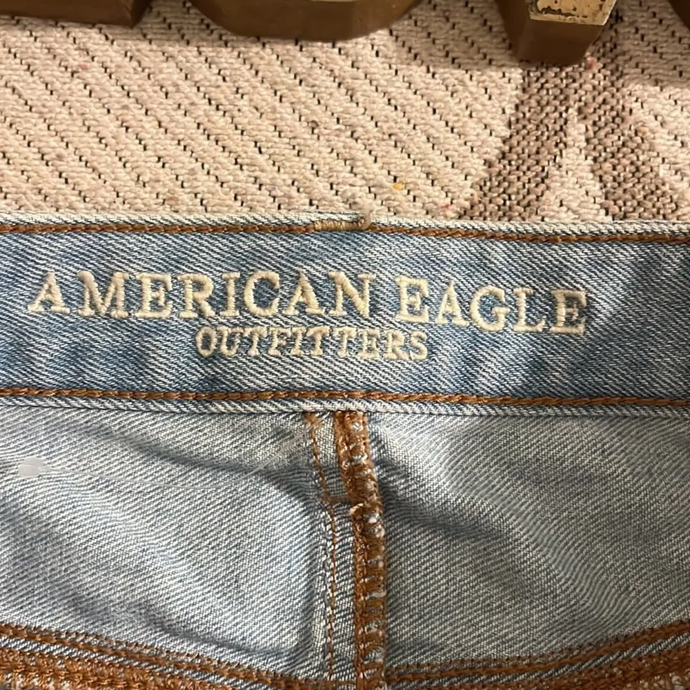 American Eagle Outfitters distressed light wash mini denim skirt - Image 9