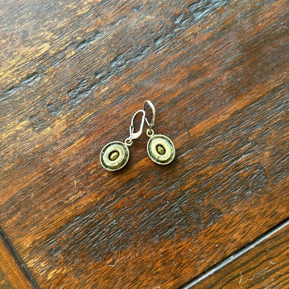 Sterling silver and green peridot French wire earrings from Sundance - Image 3