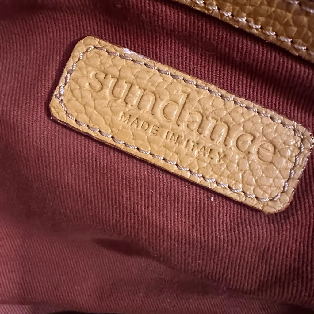 Sundance yellow pebbled vegan leather tote Bag with brown stitching and tassels. - Image 3