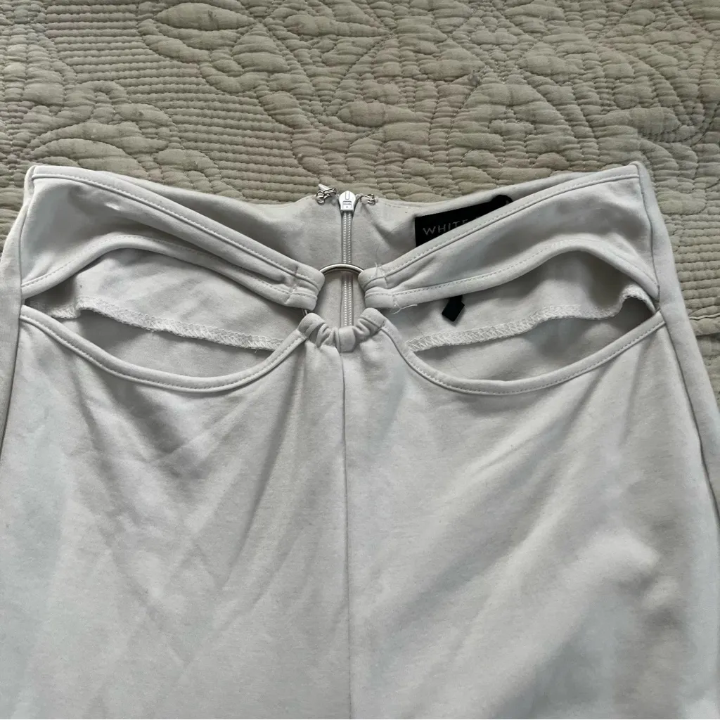 White fox boutique white cut out flare pants size small - Image 2