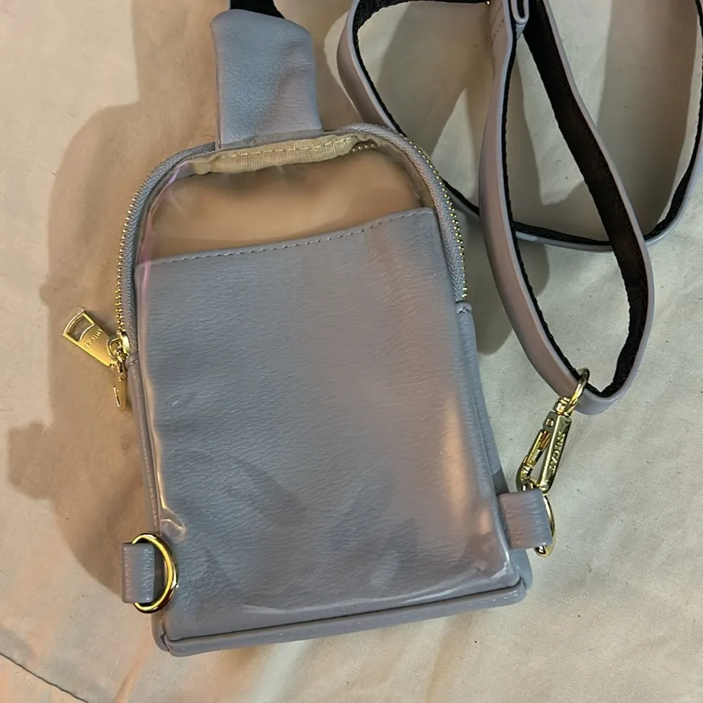 baby blue inicat crossbody bag with gold zippers and clip - Image 5