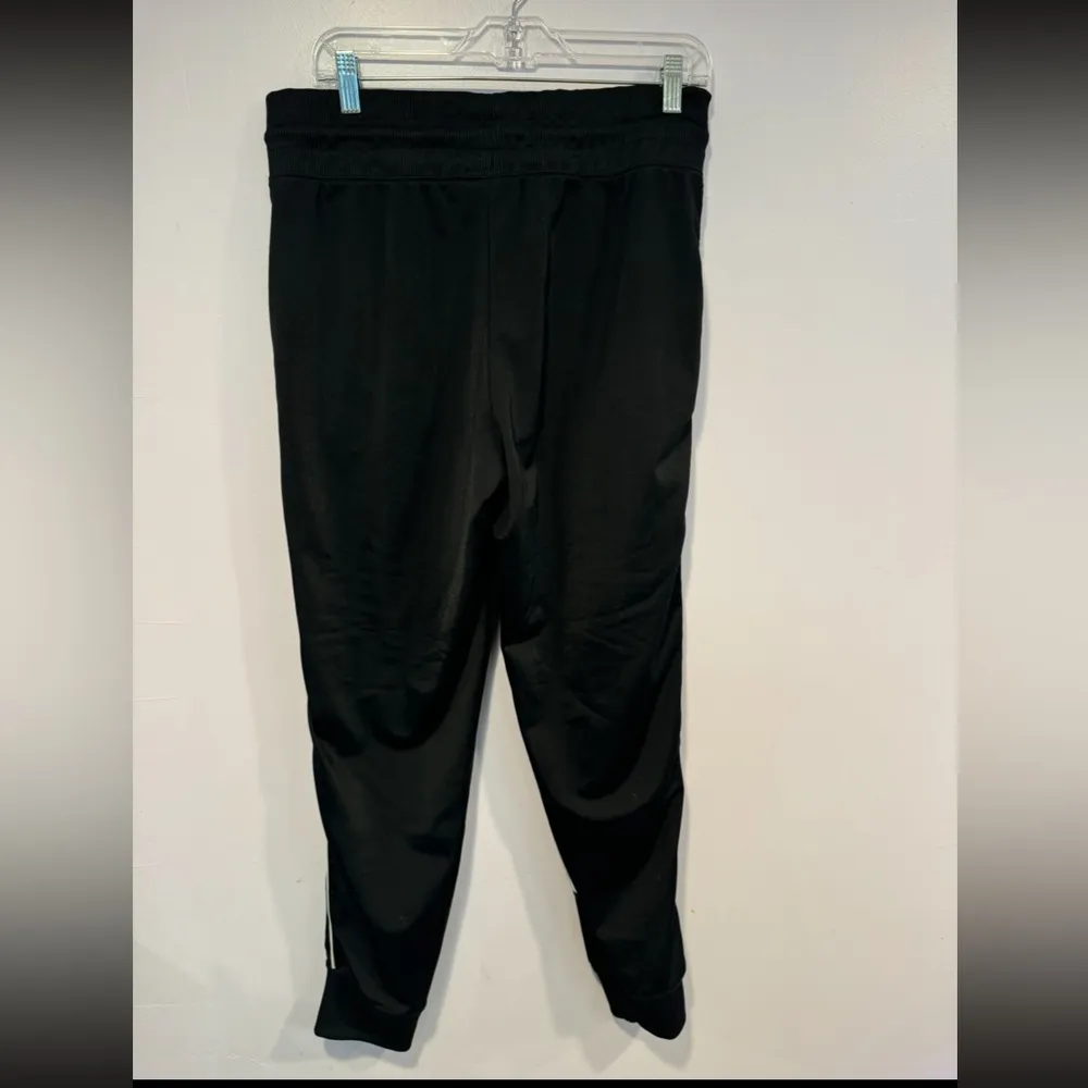 Black and‎ white Nike joggers - Image 3