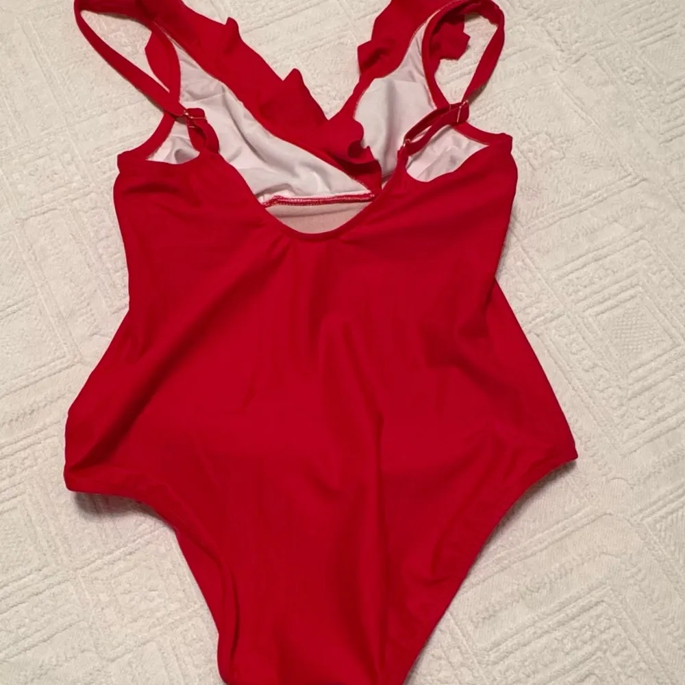Venus one piece red swim suit. Ruffles at shoulders and chest. Size 8. - Image 4