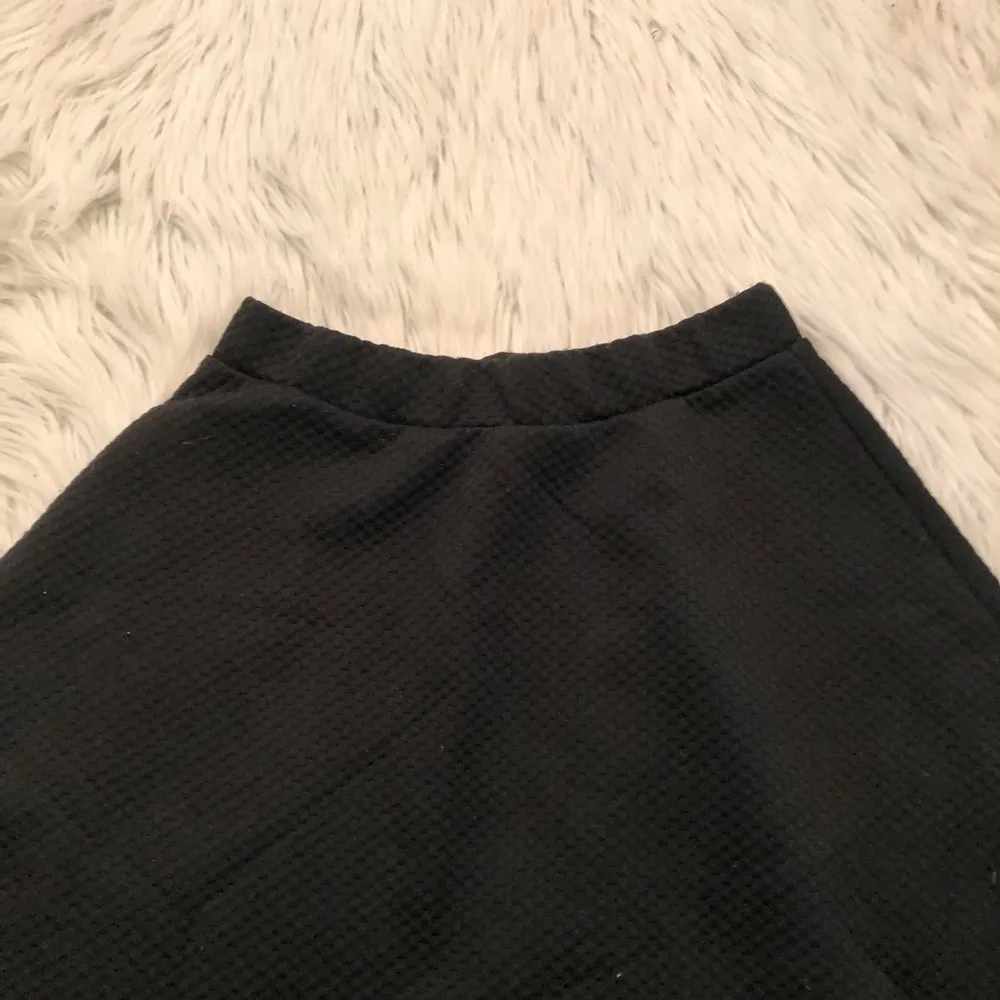 H&M Mini A-Line Flare Skirt Black Textured - Image 3