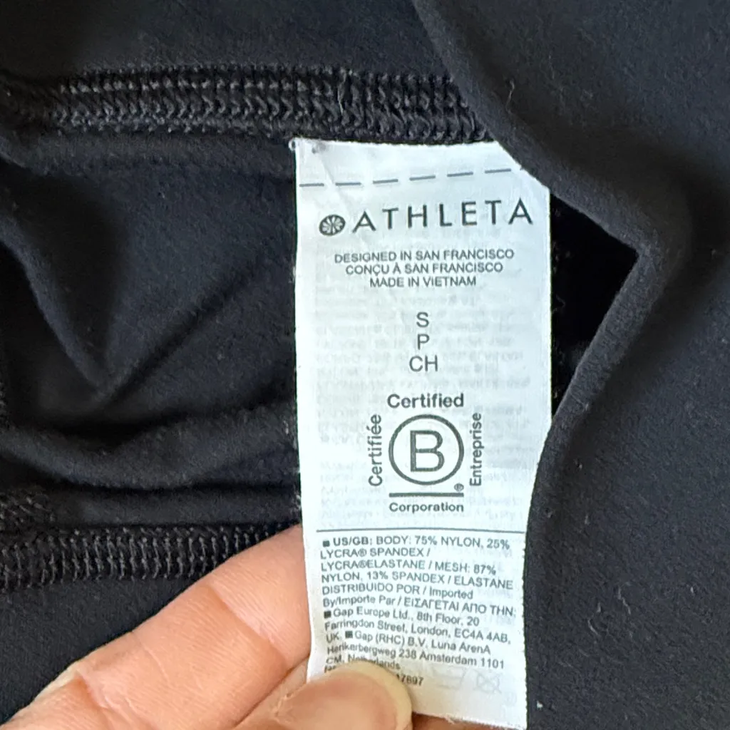 Athleta Black salutation stash pocket mesh panel. 7/8 Leggings - Image 3