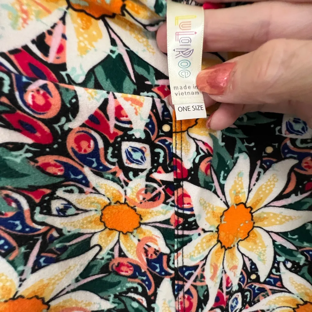 LuLaRoe  Leggings with Yellow sunflowers ontop of a green and red design. - Image 4