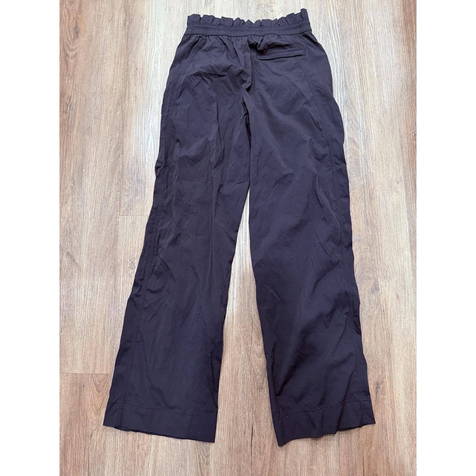 Athleta Jogger Pants Size 2 Black With Side Pockets ,‎ Zip On The Bottom Side - Image 3