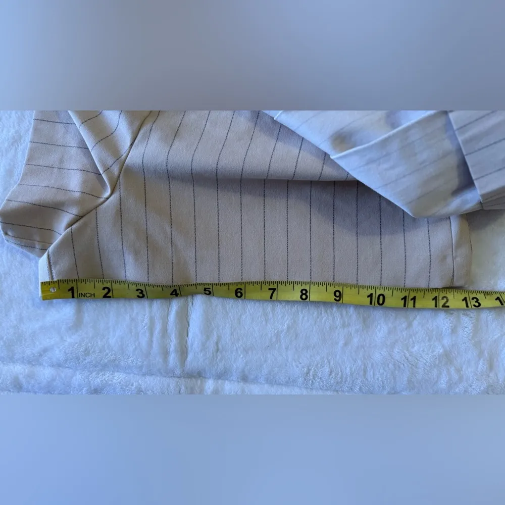 Zara Pleated Skort features a high waist, wrap front, side buckle, pleat details - Image 12