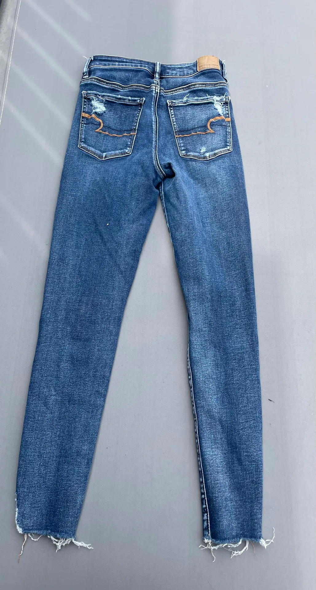 American Eagle  Stretchy Dark Wash Ripped Jeans  - Image 3