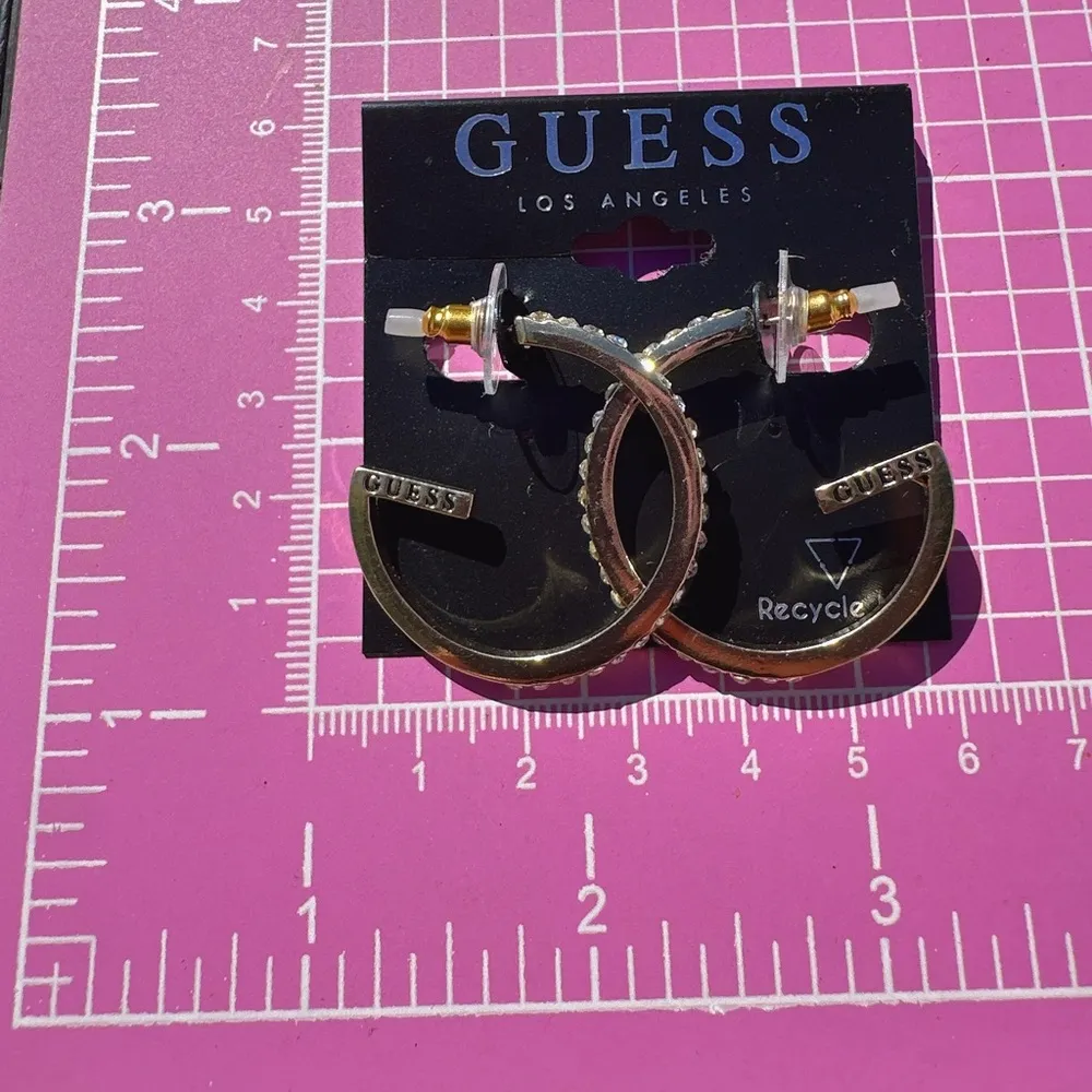 Guess Earrings G shape open loop diamond paved drops gold tone logo signed - Image 7