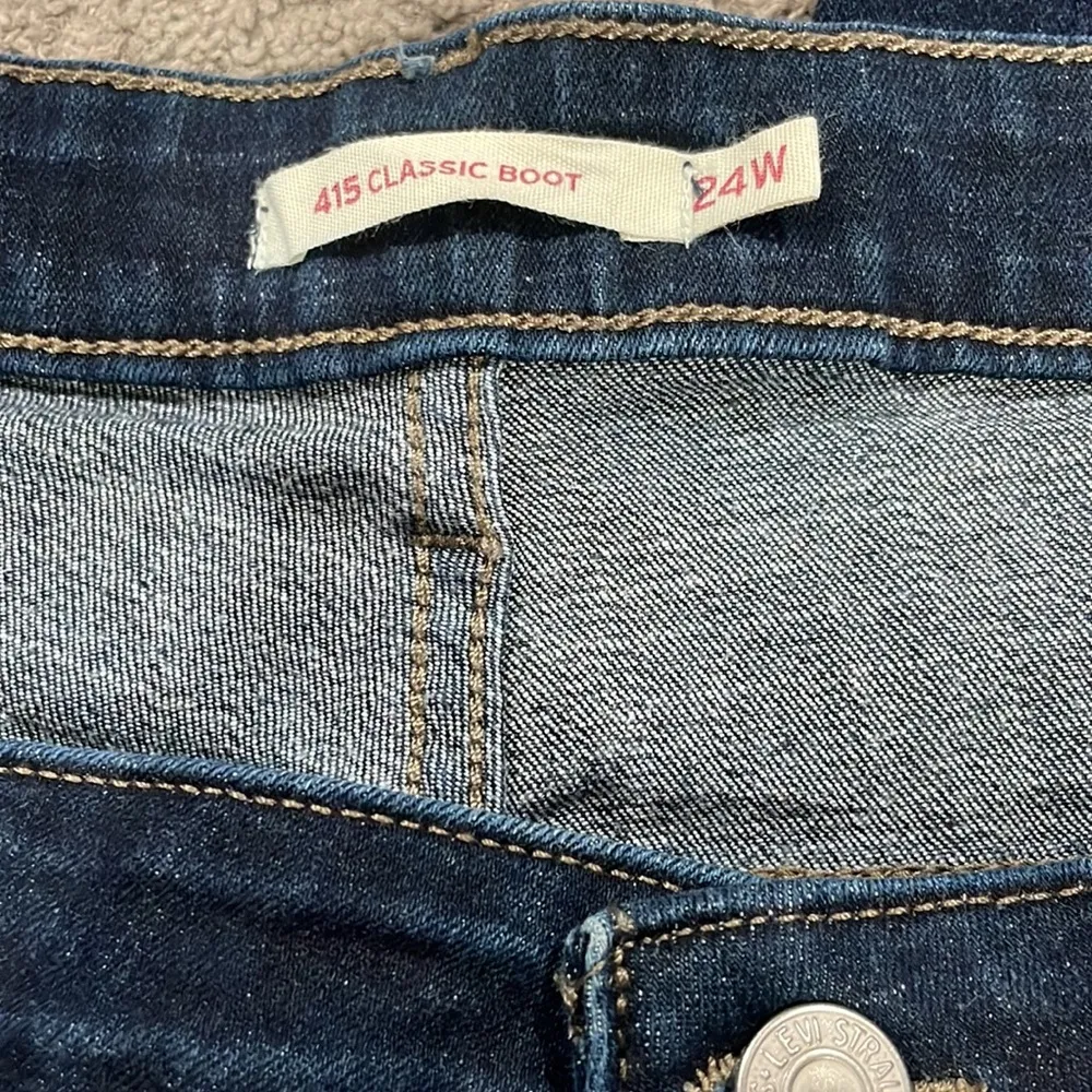 Levi’s dark denim 415 classic boot cut 30 inch inseam high rise - Image 3