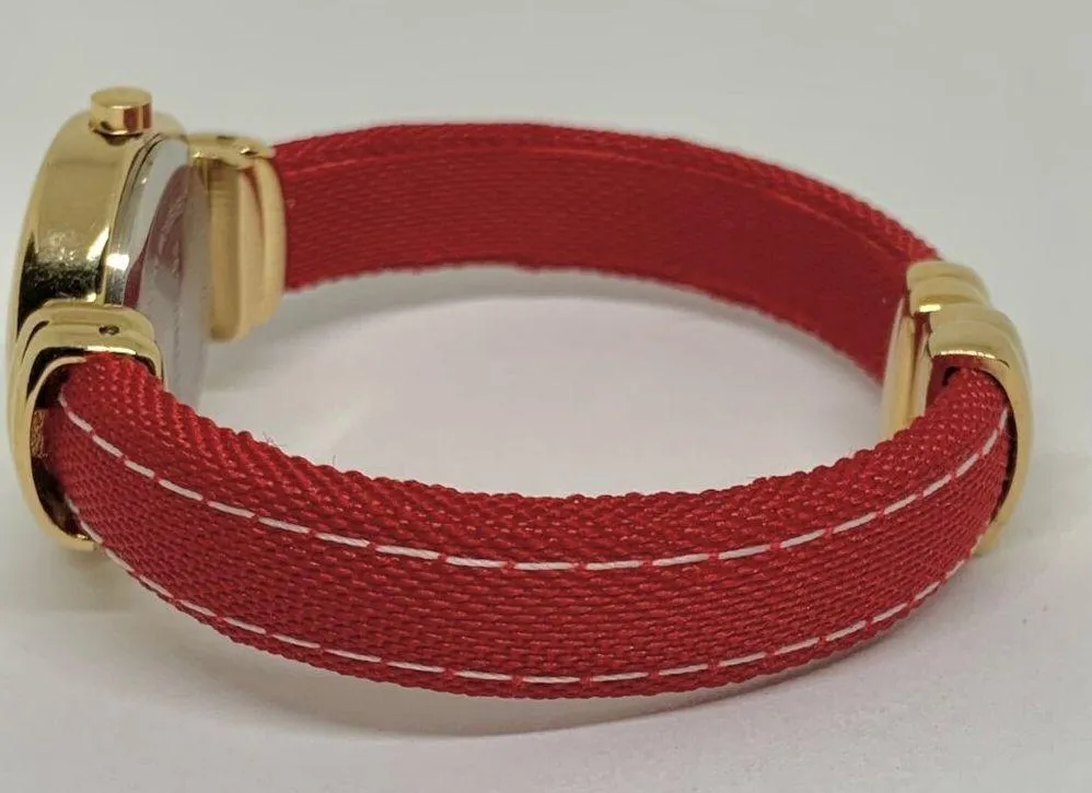 Quartz analog women’s cuff bracelet watch 26mm gold tone case red bracelet size - Image 3
