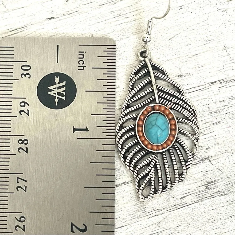Silver tone feather and faux turquoise earrings - Image 4