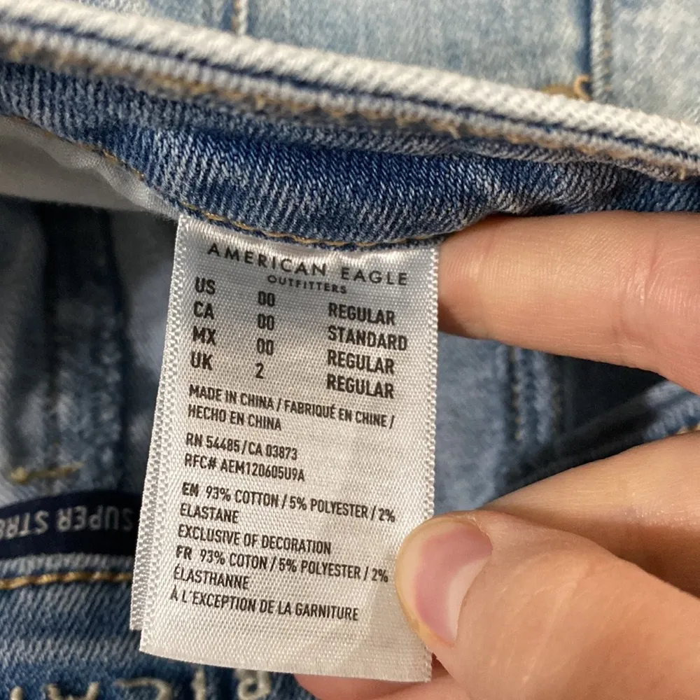 American Eagle button through high rise light wash mini denim skirt size 00 - Image 8