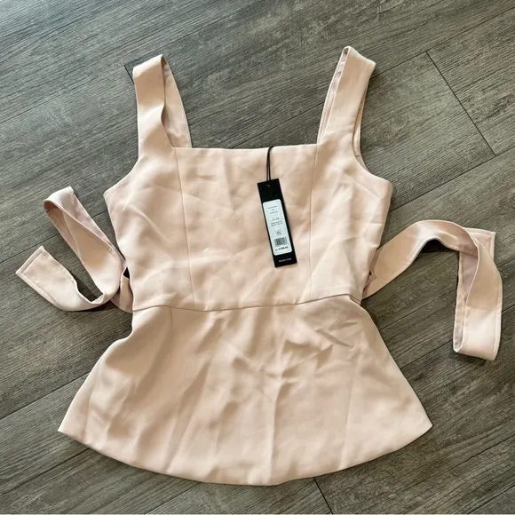 BCBGmaxazria fit and flare tie front back slit peplum top 🤍 - Image 2