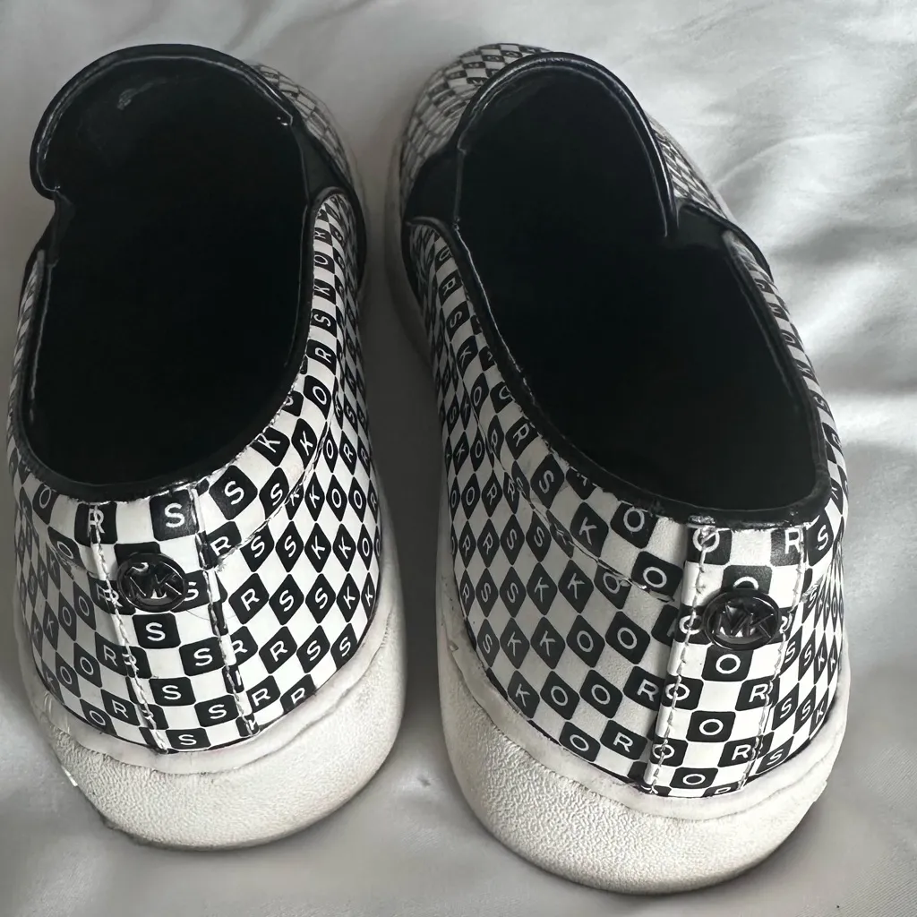Michael Kors Monogram Slip-On Sneakers in Black and White - Image 6