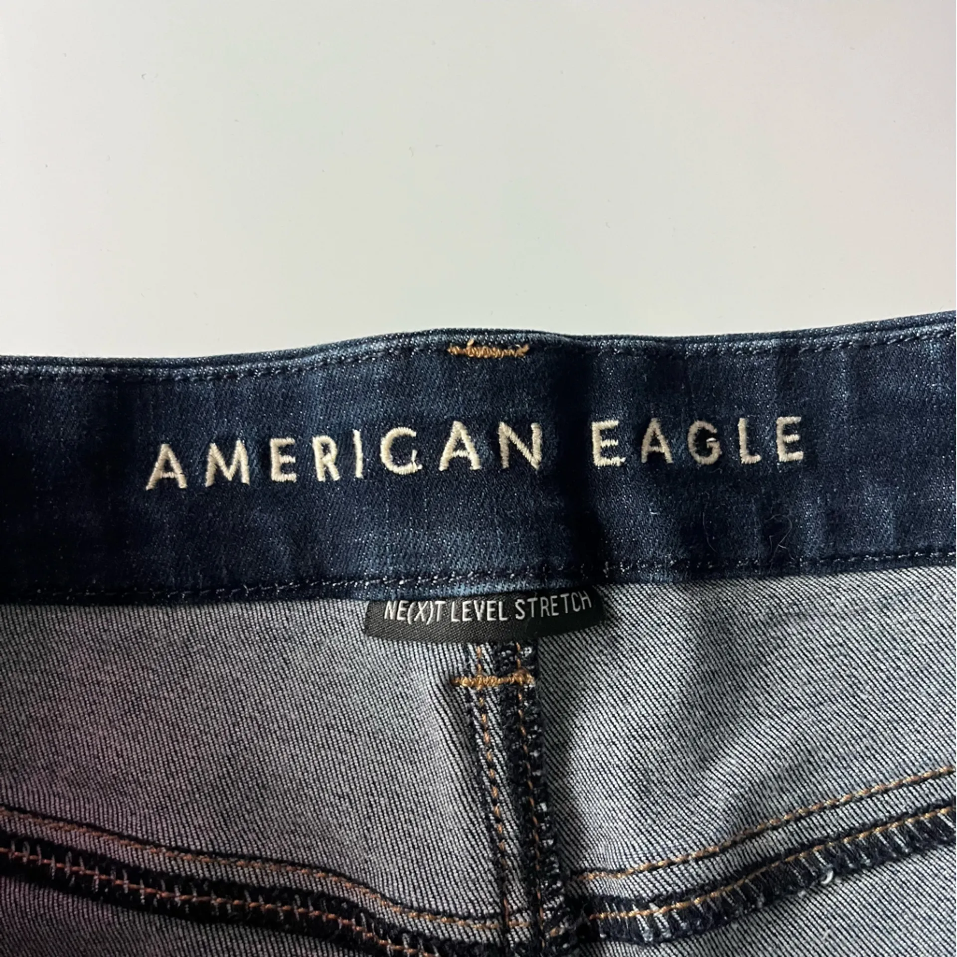 American Eagle Outfitters • Destructed Curvy High Rise Shortie Denim Shorts - Image 3