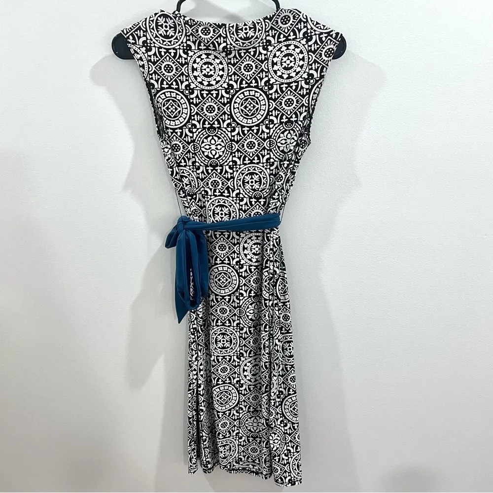 Black and white faux wrap dress with teal belt size XS - Image 4