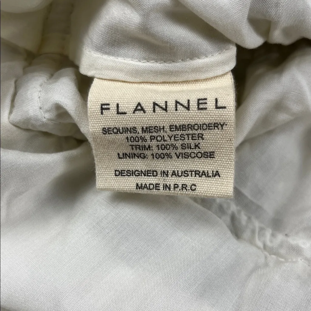 Flannel America Silver Sequin Pleated Skirt
Sz: 1 Size undefined - Image 8