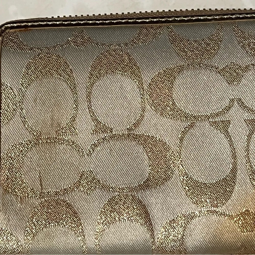 COACH signature Charlie C zip around wallet gold with purple interior - Image 10