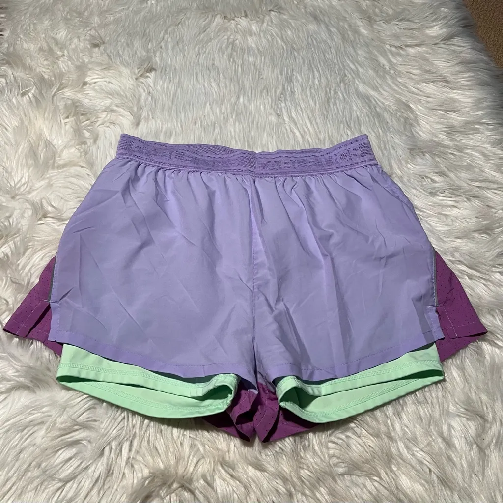 Fabletics Perforated Run 5” Shorts Fields of Lilac Iced Mint Neon - Image 4