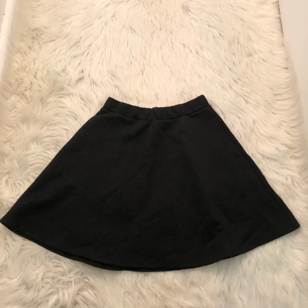 H&M Mini A-Line Flare Skirt Black Textured - Image 2
