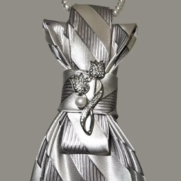 “Dainty Dapper’Elegant Silver Striped necktie necklace with floral brooch - Image 3