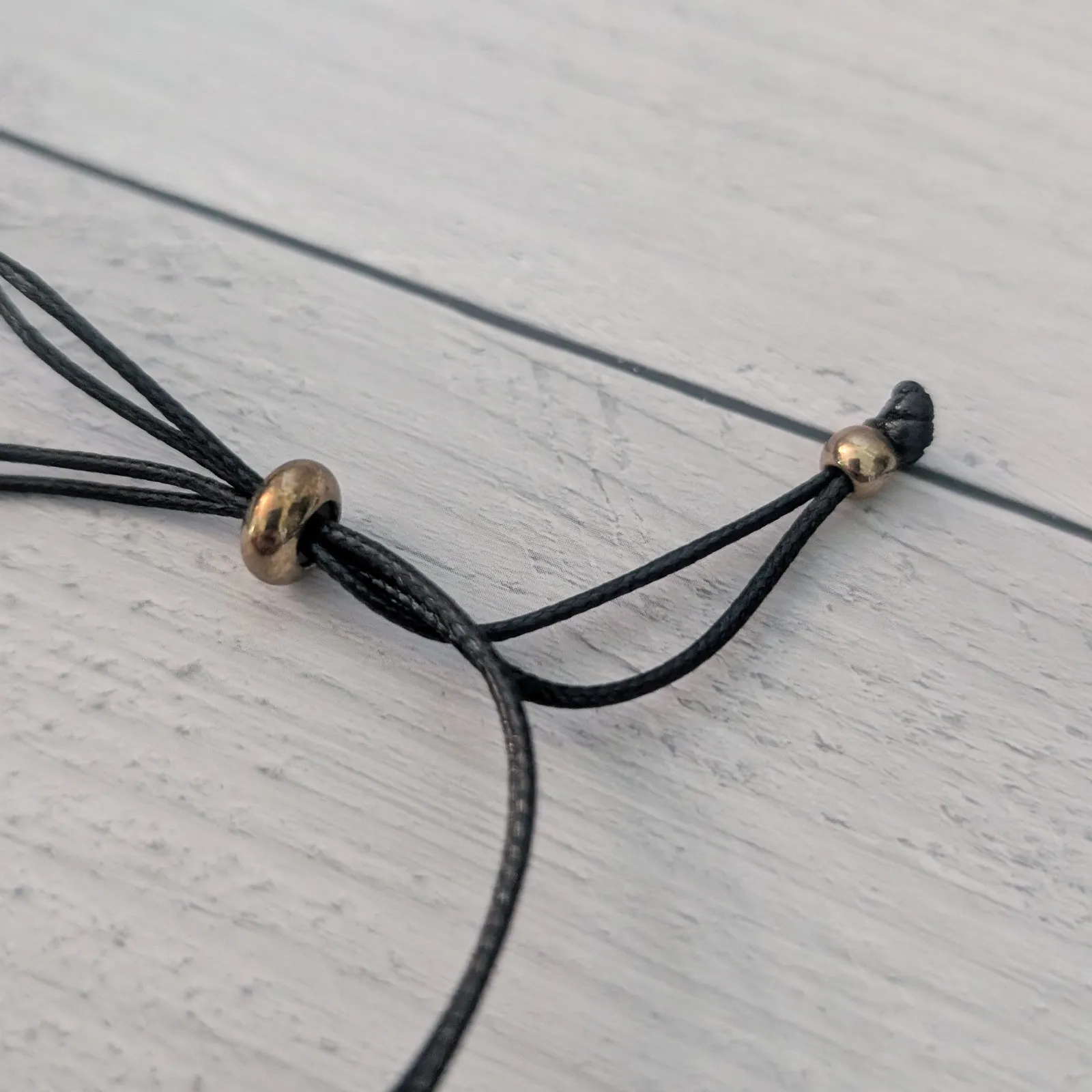 Black Adjustable Bracelet with Sunflower Charm - Image 4