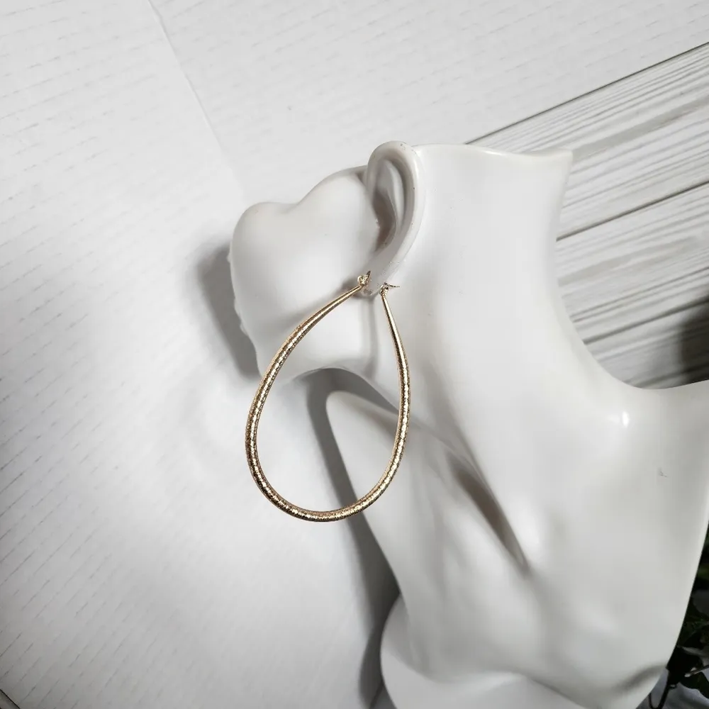 Large Gold Teardrop Hoop Earrings - Image 6