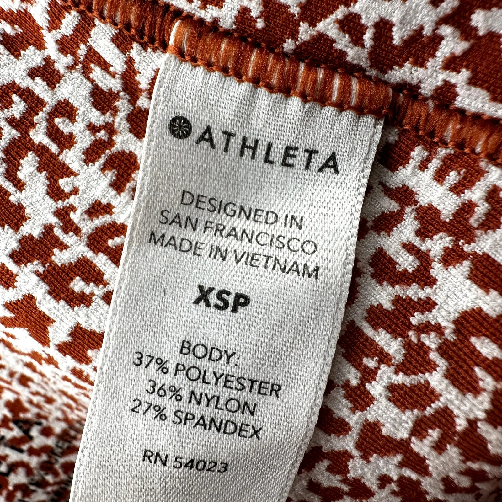 Athleta Salutation Stash II Textured Tight UPF 50 Compression Orange Cheetah XSP - Image 4